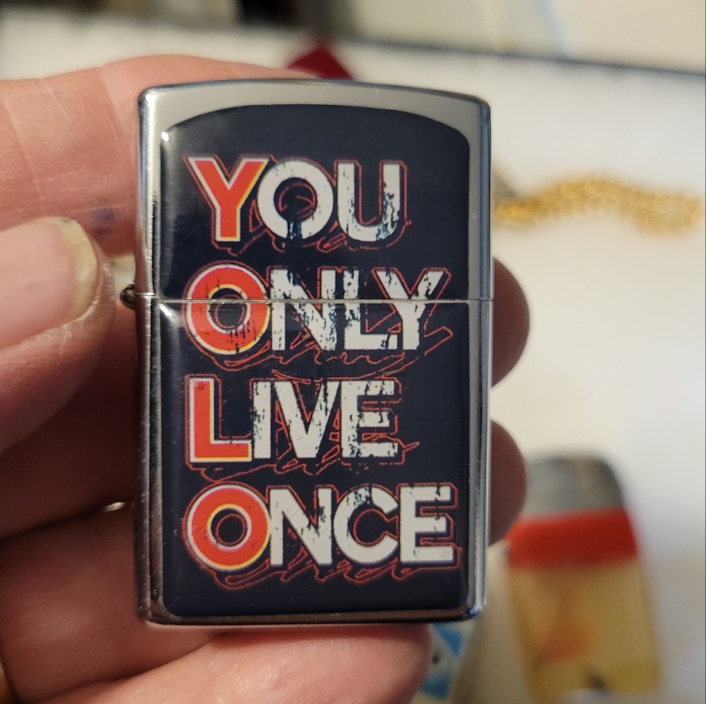 Zippo style lighter "you only live once", in good shape